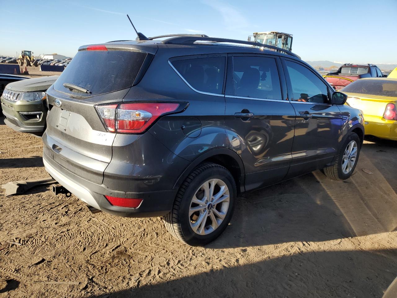 2018 Ford Escape VIN 1FMCU9HD5JUB12859 Copart auction photo, hail damage thumbnail 3