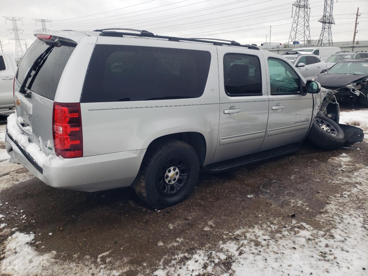 2012 Chevrolet Suburban VIN 1GNSKJE74CR132989 Copart auction photo, front end / undercarriage damage thumbnail 3
