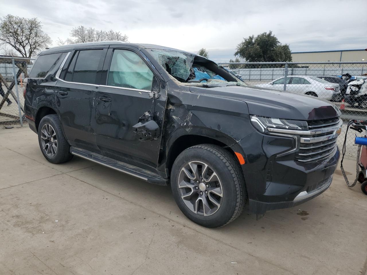 2023 Chevrolet Tahoe VIN 1GNSCNKD2PR168880 Copart auction photo, all over damage thumbnail 4