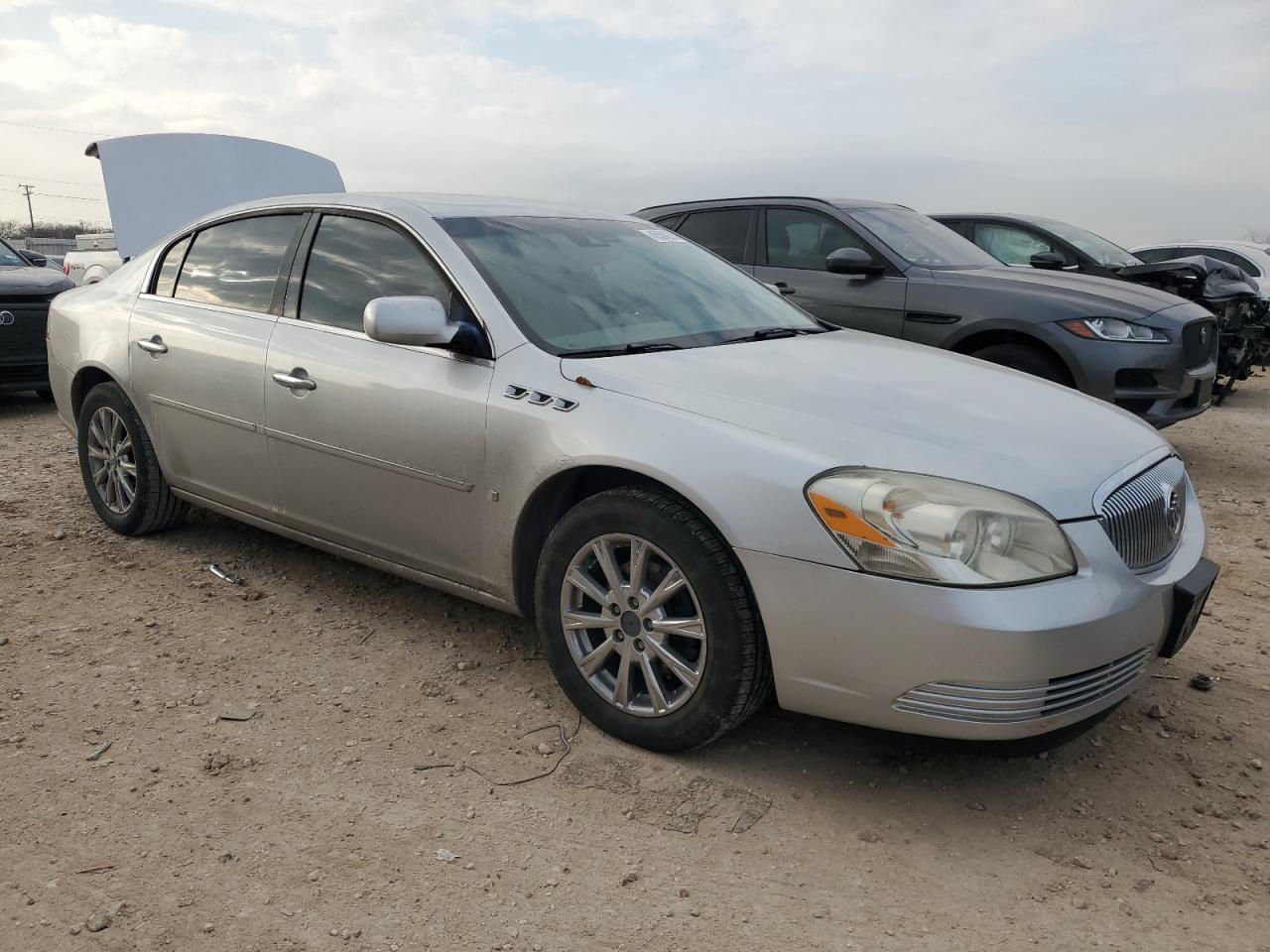 2009 Buick Lucerne VIN 1G4HD57M19U125779 Copart auction photo, rear end / minor dent/scratches damage thumbnail 4