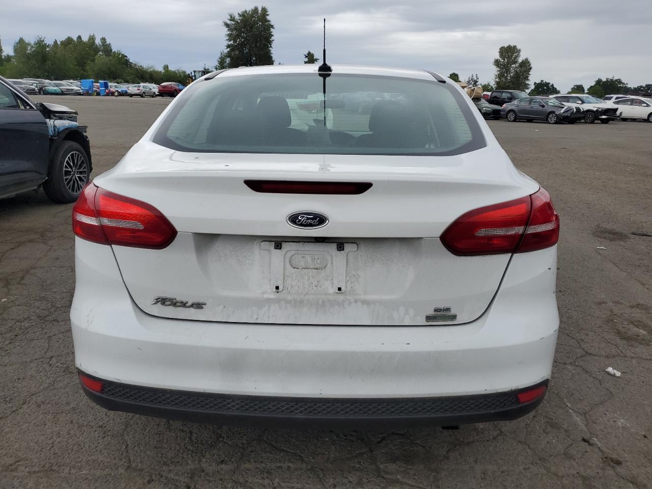 2017 Ford Focus VIN 1FADP3FE6HL307822 Copart auction photo, side damage thumbnail 6