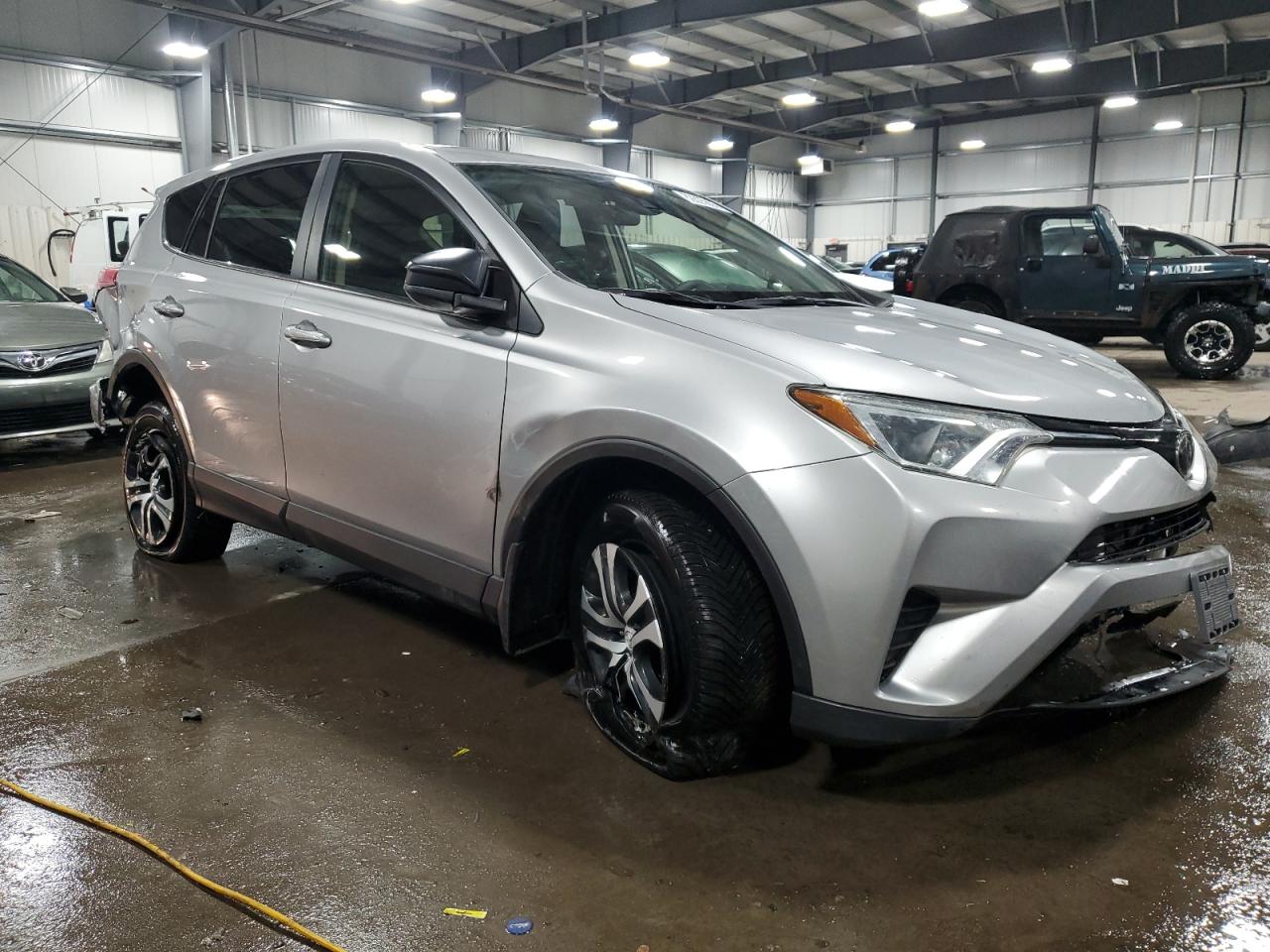 2018 Toyota RAV 4 VIN JTMBFREV0JJ239219 Copart auction photo, all over damage thumbnail 4