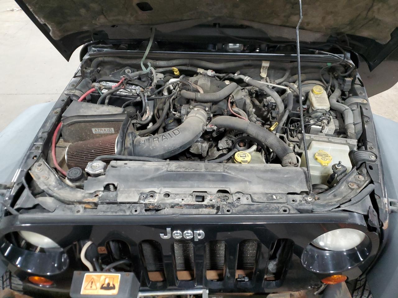 2009 Jeep Wrangler VIN 1J4GA64159L770895 Copart auction photo, front end damage thumbnail 12