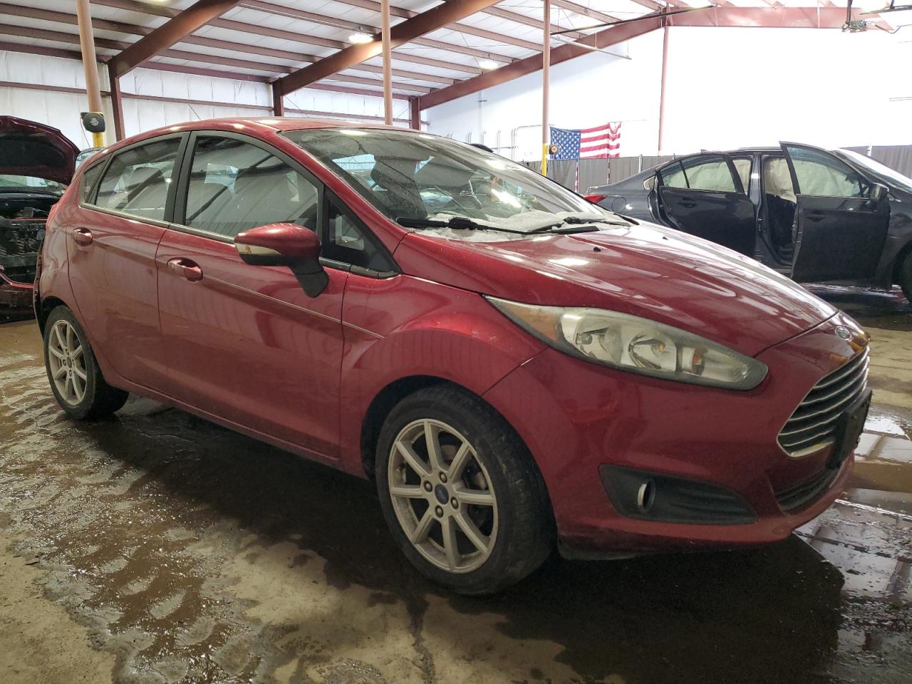 2016 Ford Fiesta VIN 3FADP4EJXGM103705 Copart auction photo, rear end / undercarriage damage thumbnail 4