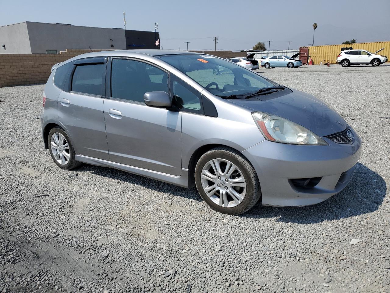 2010 Honda Fit VIN JHMGE8H64AS012521 Copart auction photo, side / front end damage thumbnail 4