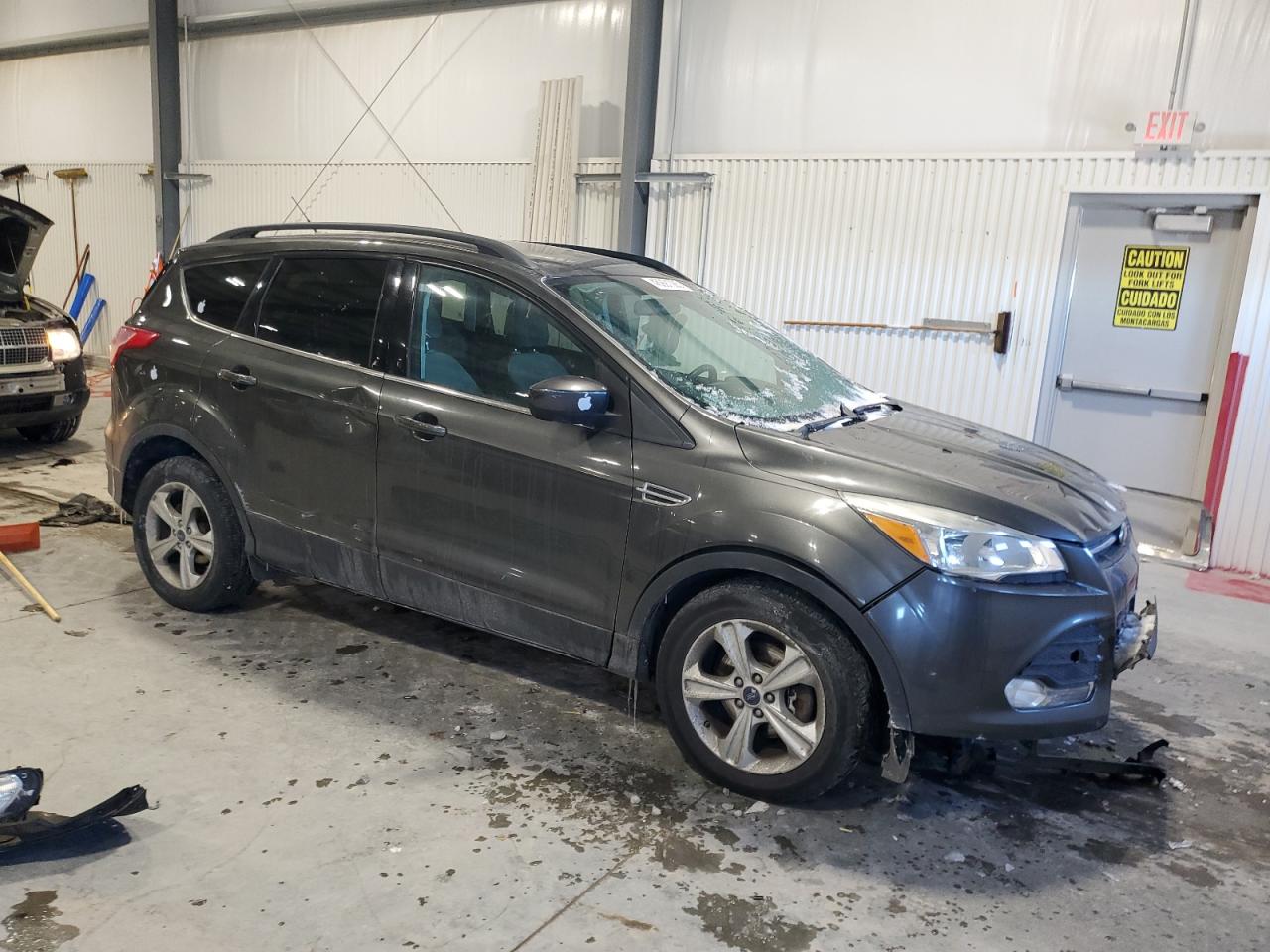 2016 Ford Escape VIN 1FMCU9G93GUC10827 Copart auction photo, front end / side damage thumbnail 4