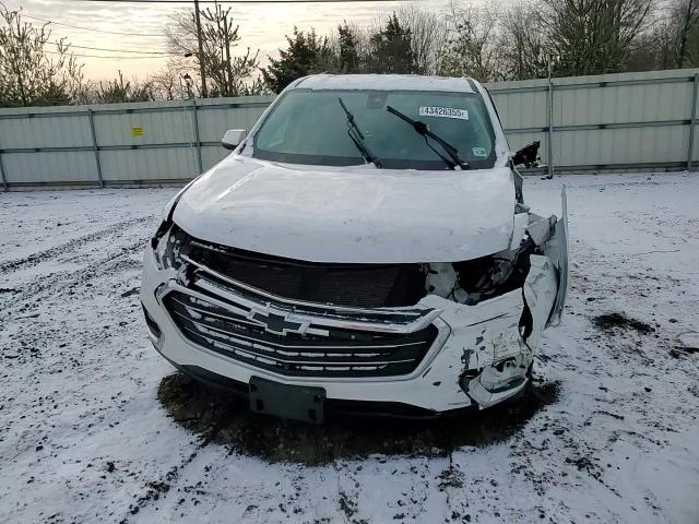 2021 Chevrolet Traverse VIN 1GNERHKWXMJ252163 Copart auction photo, side / front end damage thumbnail 11
