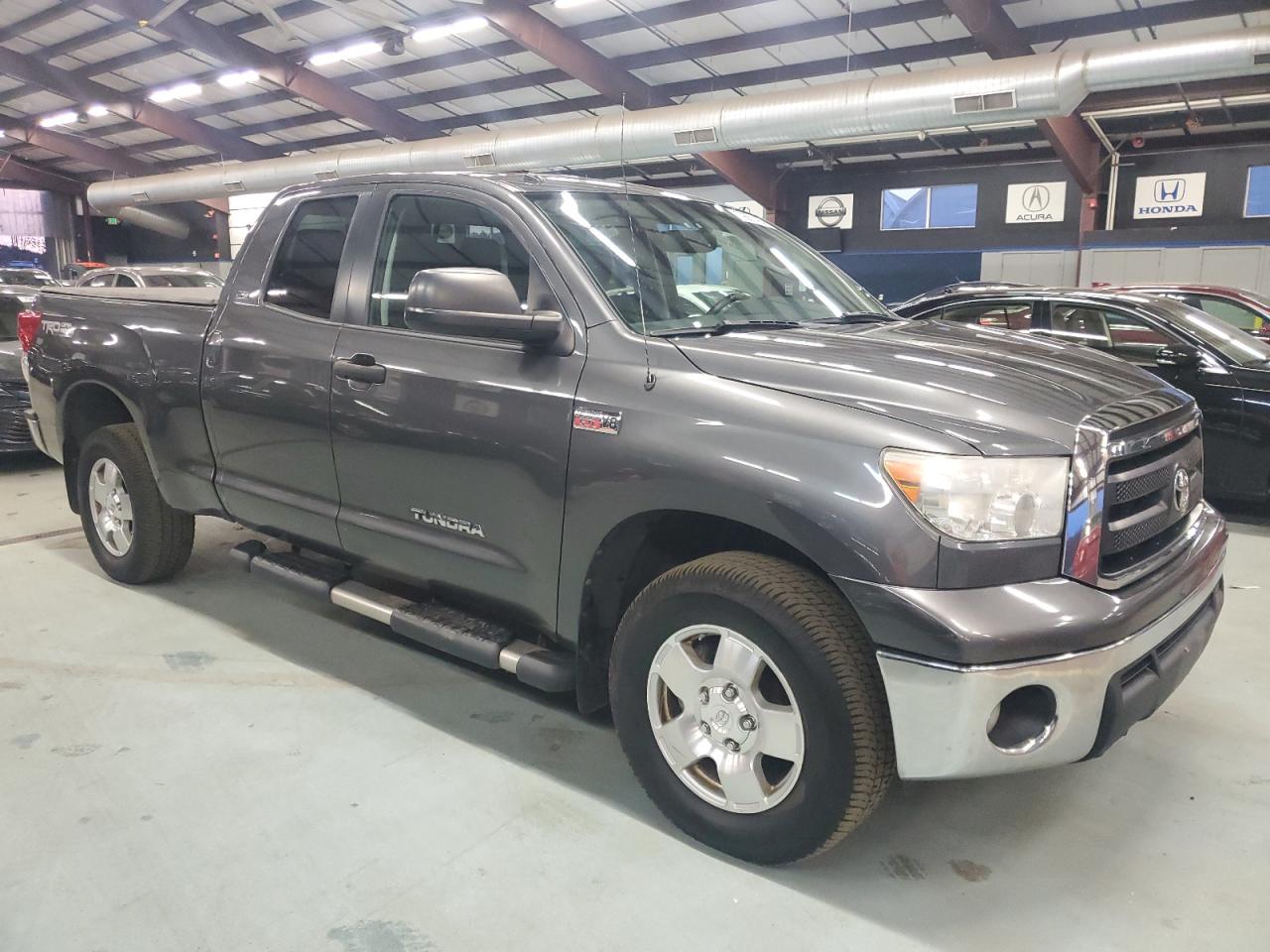 2012 Toyota Tundra VIN 5TFUY5F18CX216777 Copart auction photo, minor dent/scratches damage thumbnail 4