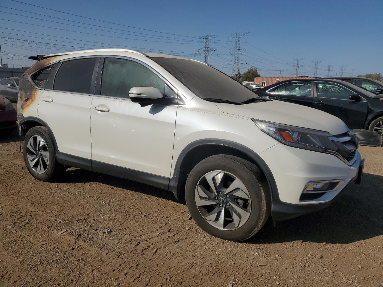 2016 Honda CR-V VIN 5J6RM4H91GL060488 Copart auction photo, burn - interior / burn damage thumbnail 4