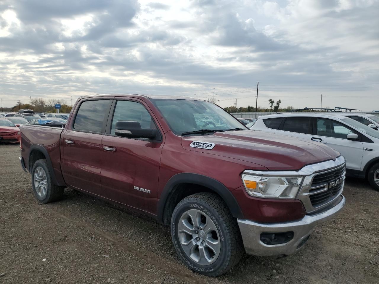 2020 RAM 1500 VIN 1C6SRFFT2LN119976 Copart auction photo, front end / hail damage thumbnail 4