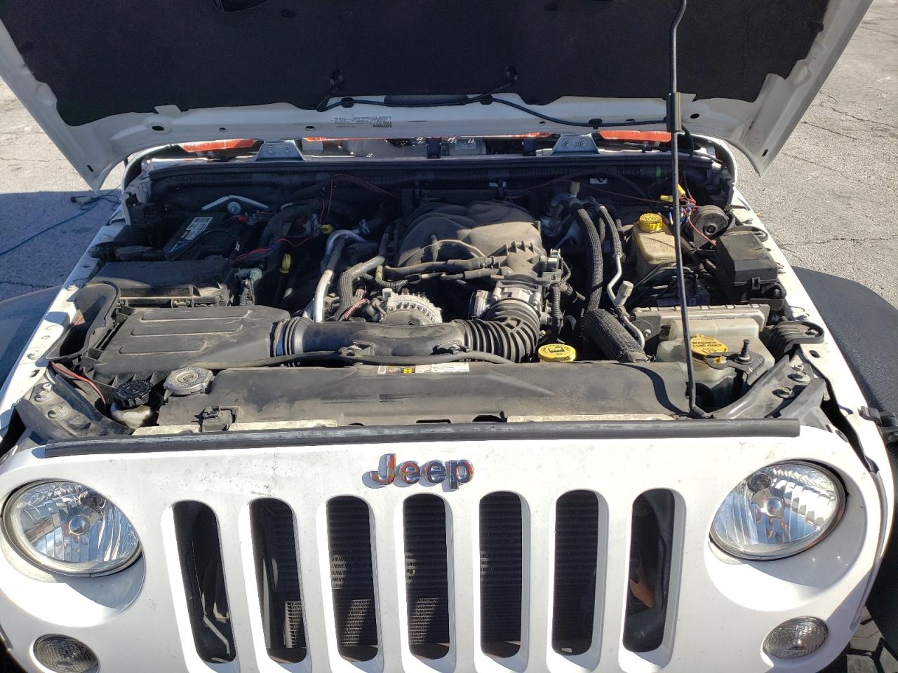 2015 Jeep Wrangler VIN 1C4HJWFG0FL615405 Copart auction photo, side / minor dent/scratches damage thumbnail 12
