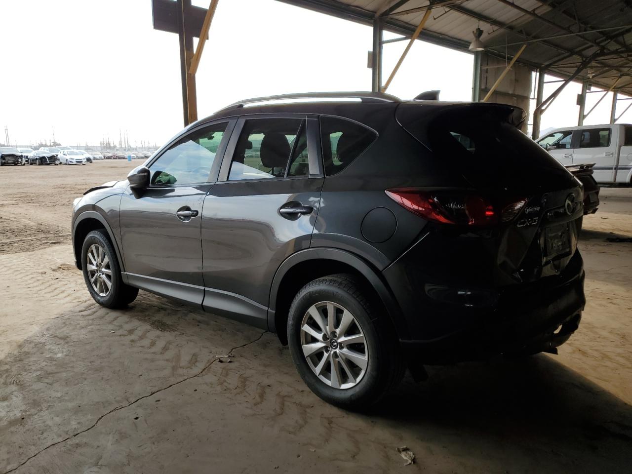 2015 Mazda CX-5 VIN JM3KE2CYXF0553231 Copart auction photo, rear end / front end damage thumbnail 2