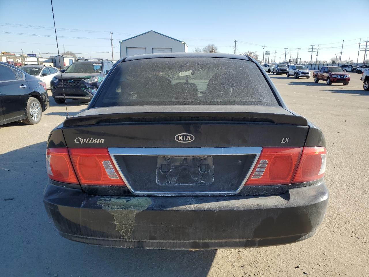 2004 KIA Optima VIN KNAGD126545357660 Copart auction photo, side / rear end damage thumbnail 6
