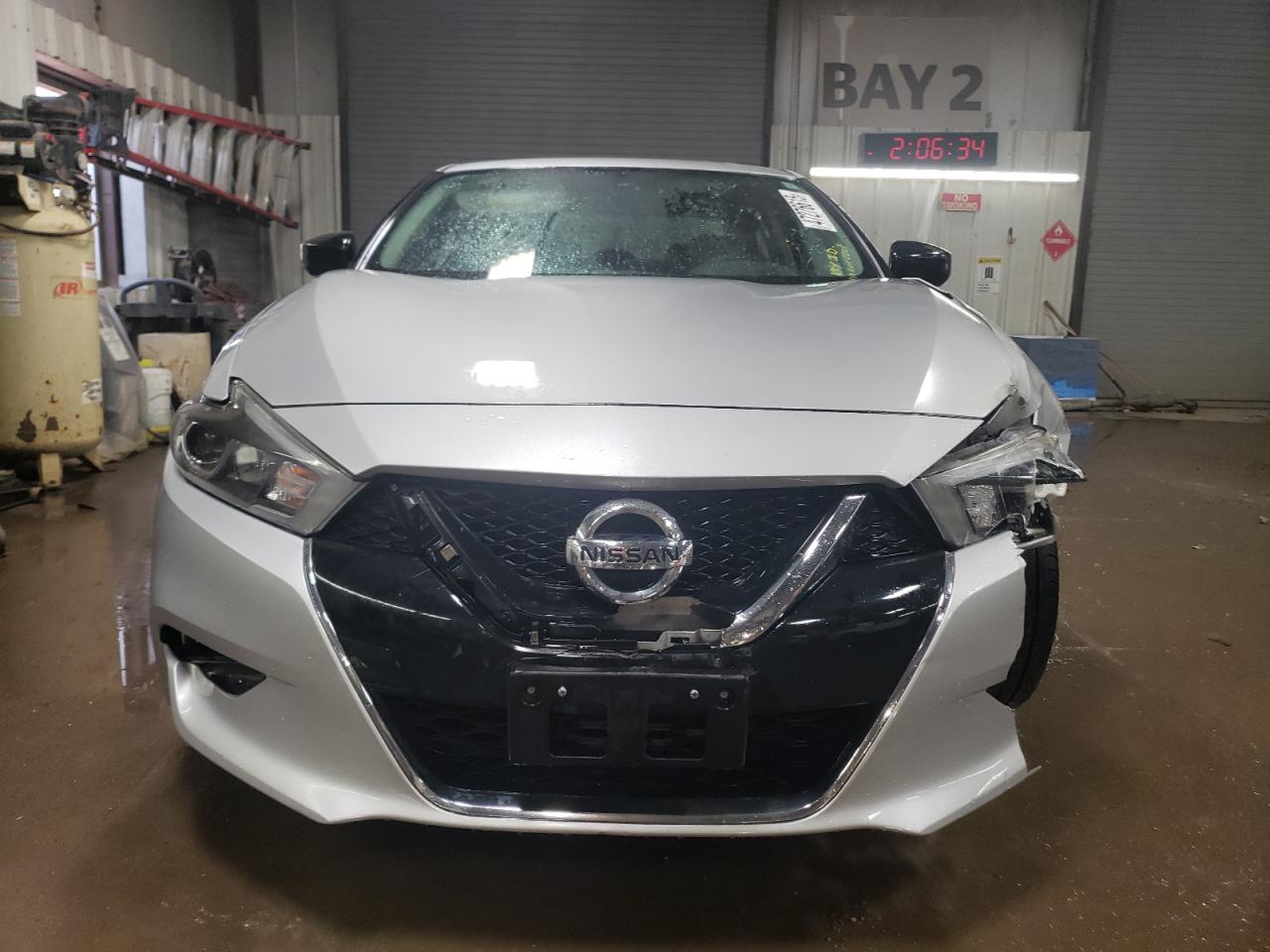 2018 Nissan Maxima VIN 1N4AA6AP2JC375992 Copart auction photo, side / front end damage thumbnail 5