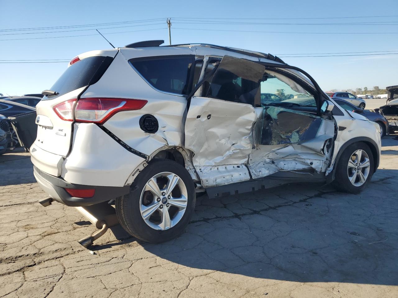 2015 Ford Escape VIN 1FMCU0GXXFUC85680 Copart auction photo, side / front end damage thumbnail 3