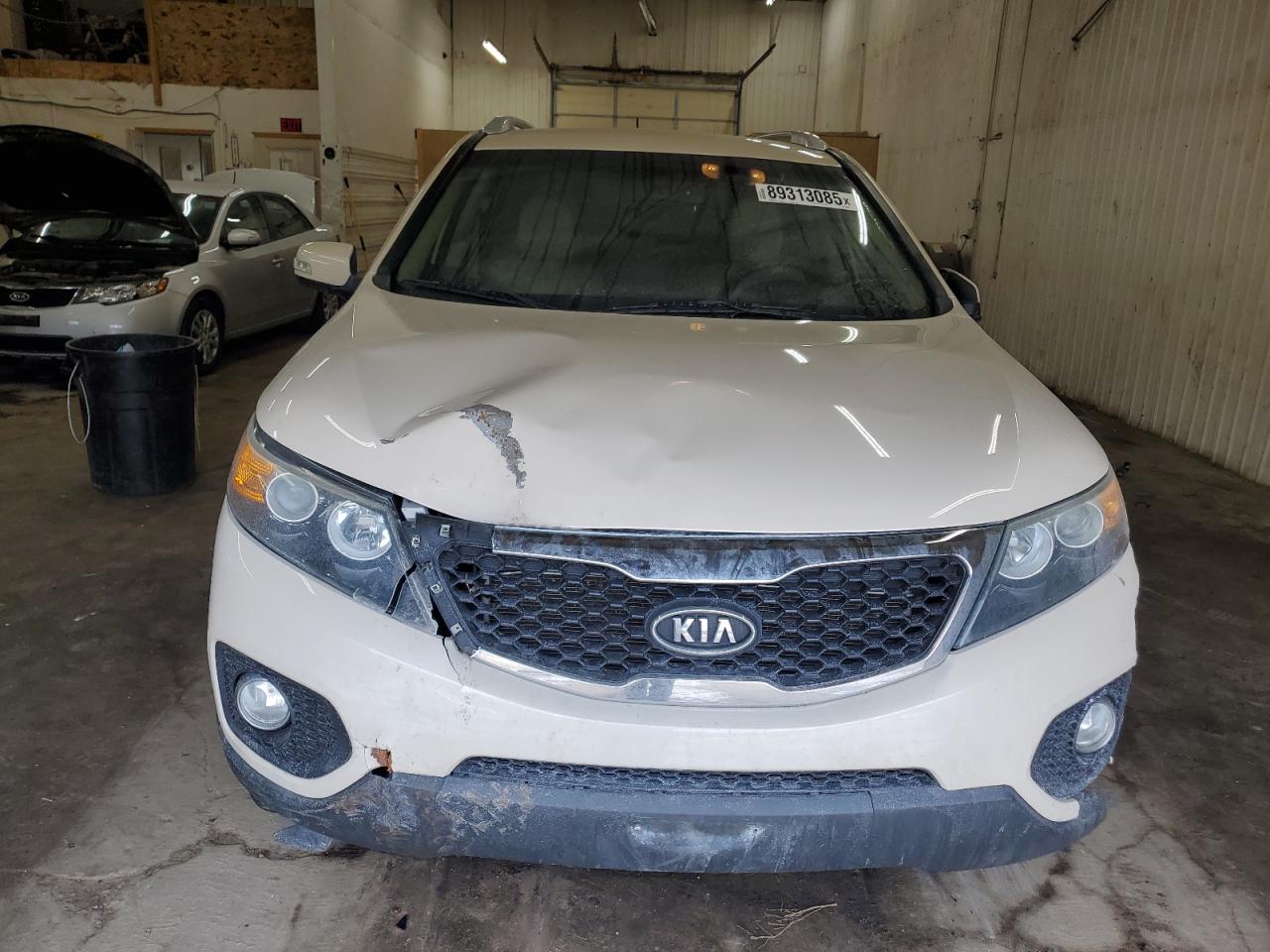 2011 KIA Sorento VIN 5XYKU4A15BG002660 Copart auction photo, front end / undercarriage damage thumbnail 5