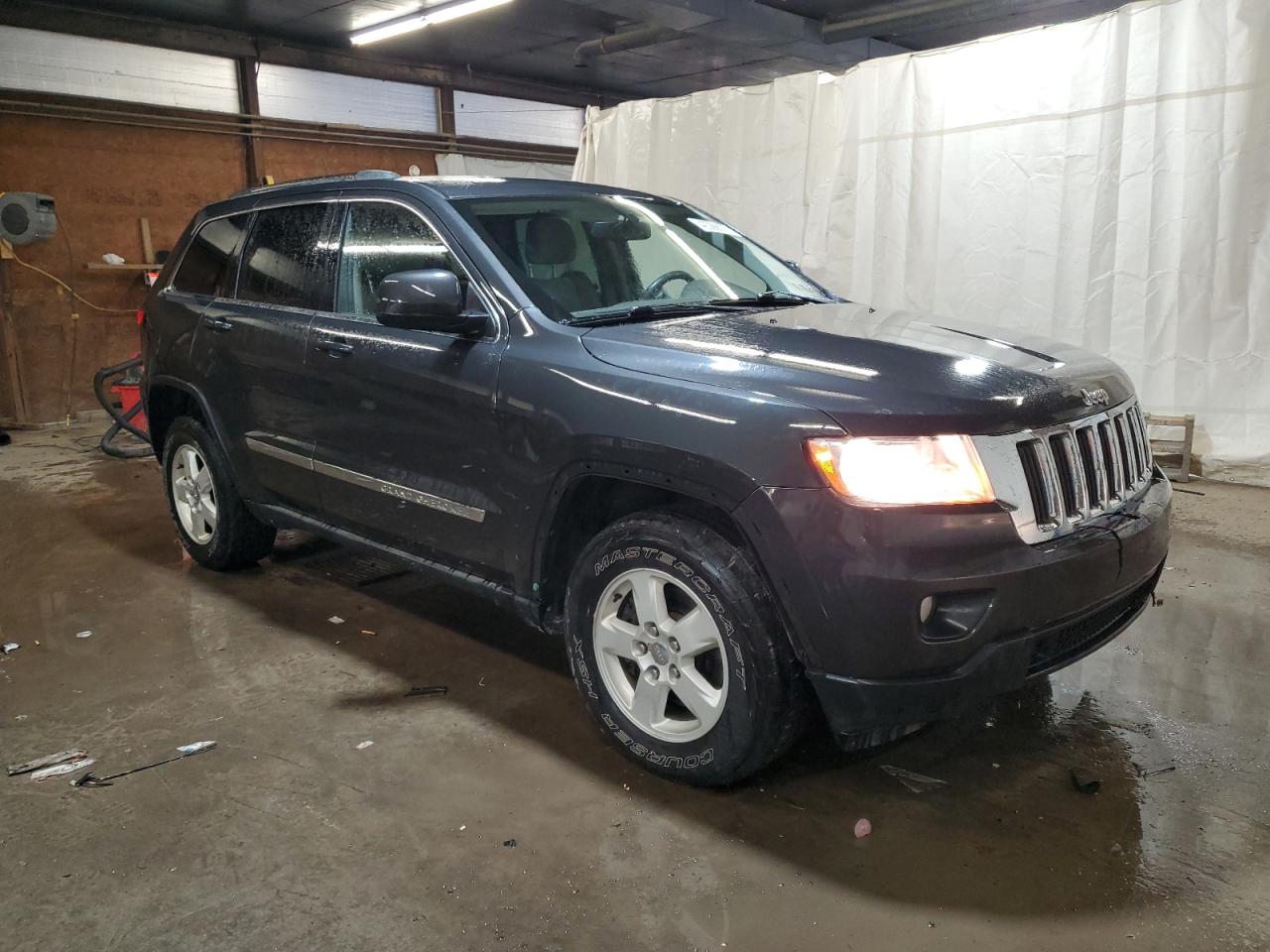 2011 Jeep Grand Cherokee VIN 1J4RR4GG8BC540490 Copart auction photo, front end / side damage thumbnail 4