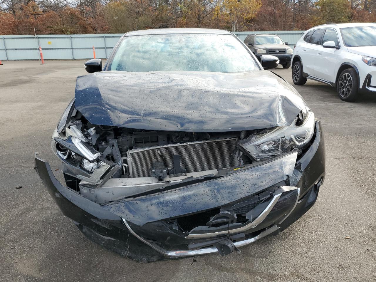 2018 Nissan Maxima VIN 1N4AA6AP7JC405682 Copart auction photo, front end / minor dent/scratches damage thumbnail 5