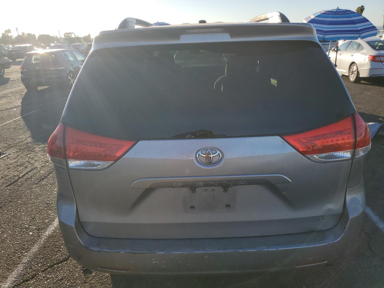 2012 Toyota Sienna VIN 5TDKK3DC1CS212755 Copart auction photo, front end / minor dent/scratches damage thumbnail 6