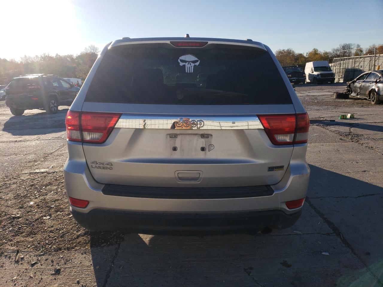 2011 Jeep Grand Cherokee VIN 1J4RR4GG3BC566673 Copart auction photo, front end / side damage thumbnail 6