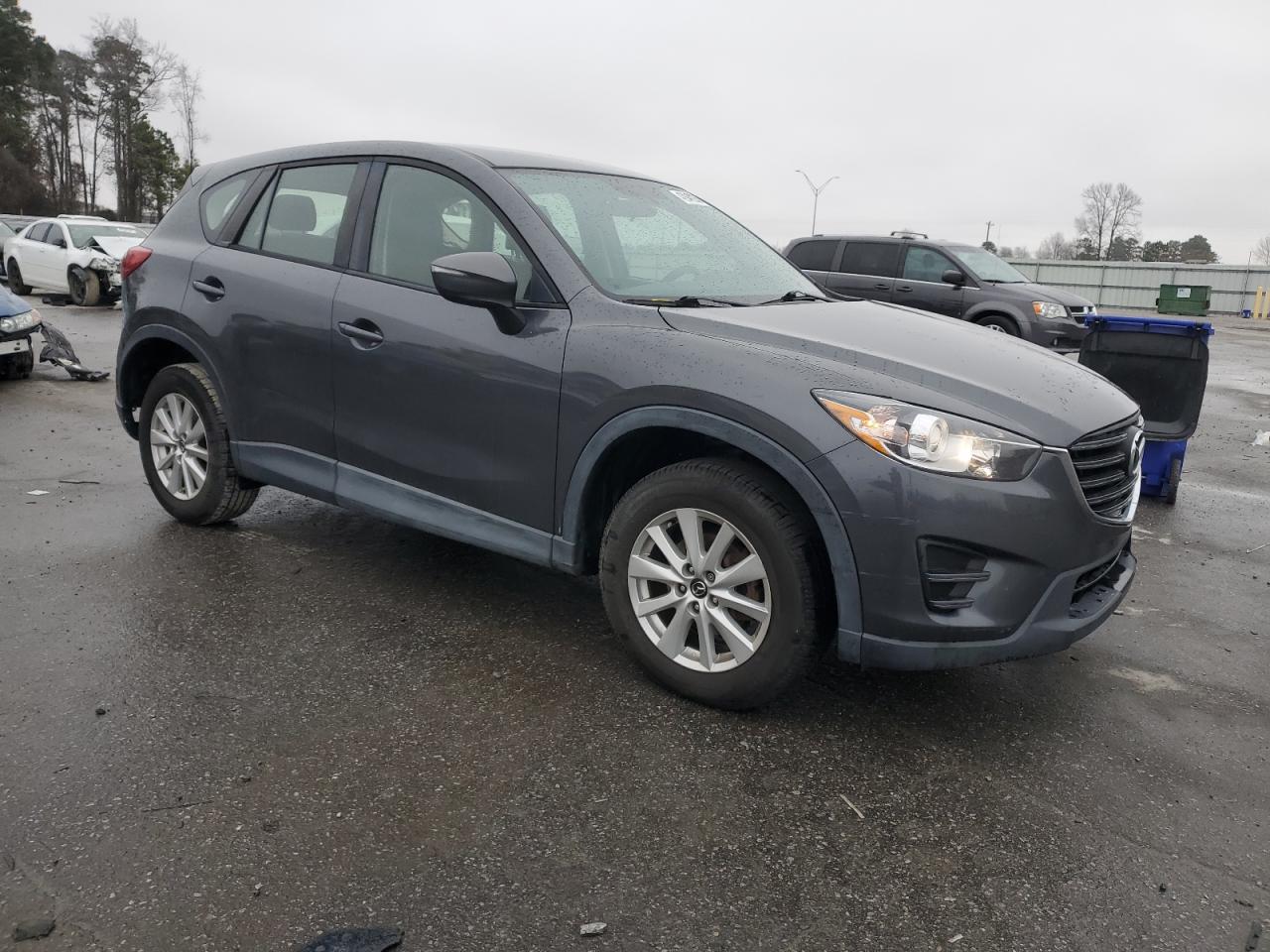 2016 Mazda CX-5 VIN JM3KE2BY8G0793154 Copart auction photo, rear end / frame damage damage thumbnail 4