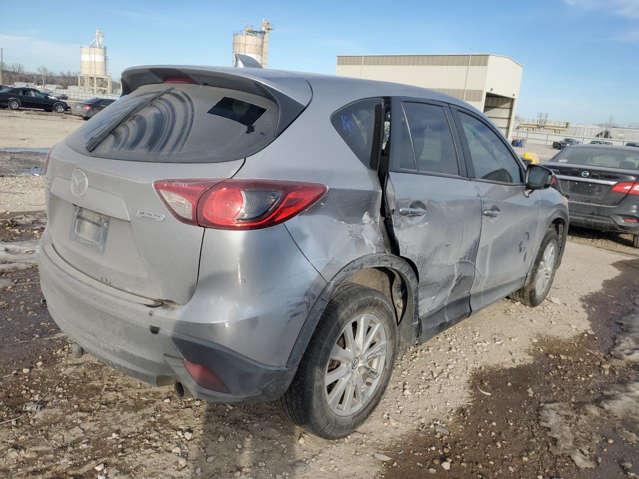 2015 Mazda CX-5 VIN JM3KE4CY5F0440010 Copart auction photo, side damage thumbnail 3