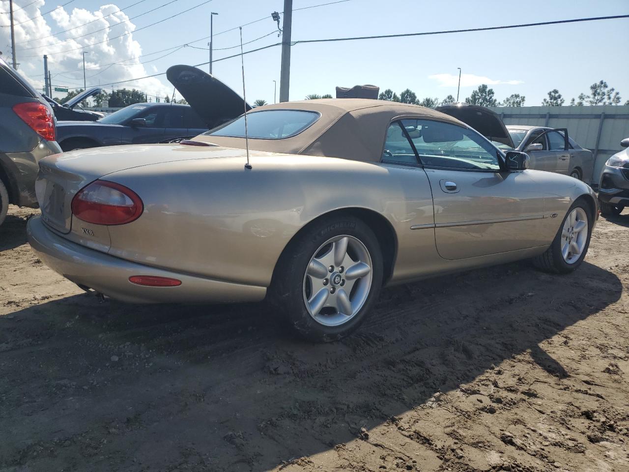 1999 Jaguar XK VIN SAJGX2048XC039454 Copart auction photo, water/flood damage thumbnail 3