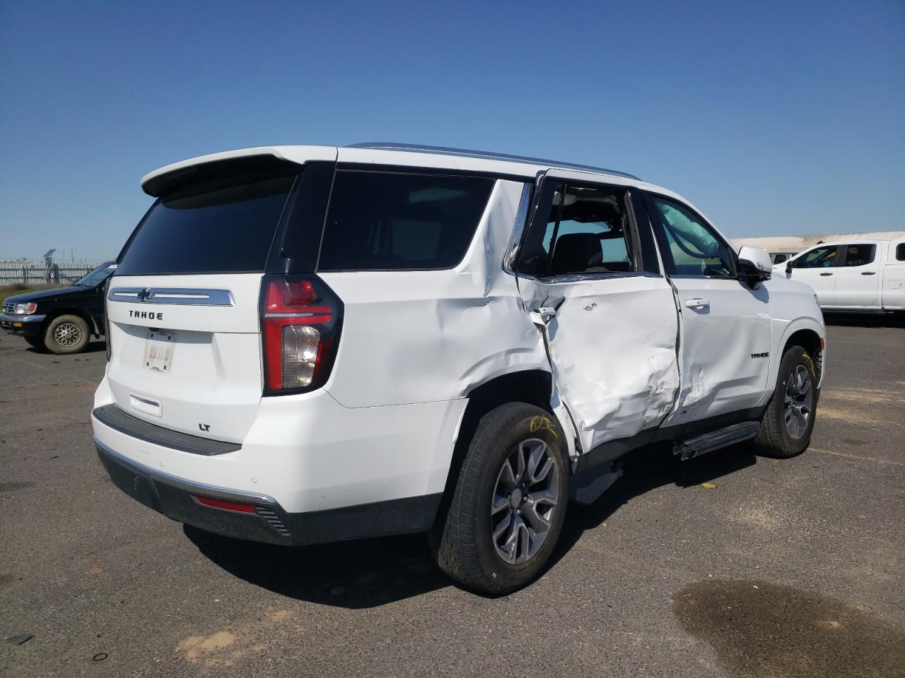 2022 Chevrolet Tahoe VIN 1GNSKNKD1NR264046 Copart auction photo, side damage thumbnail 3