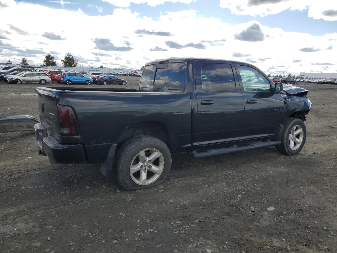 2015 RAM 1500 VIN 1C6RR7MT1FS770688 Copart auction photo, front end / side damage thumbnail 3