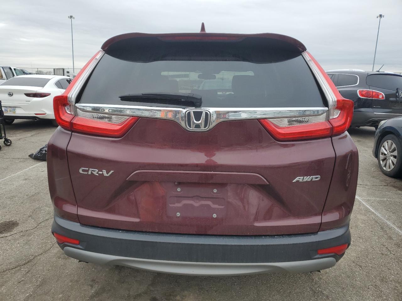 2019 Honda CR-V VIN 2HKRW2H52KH662895 Copart auction photo, side / front end damage thumbnail 6