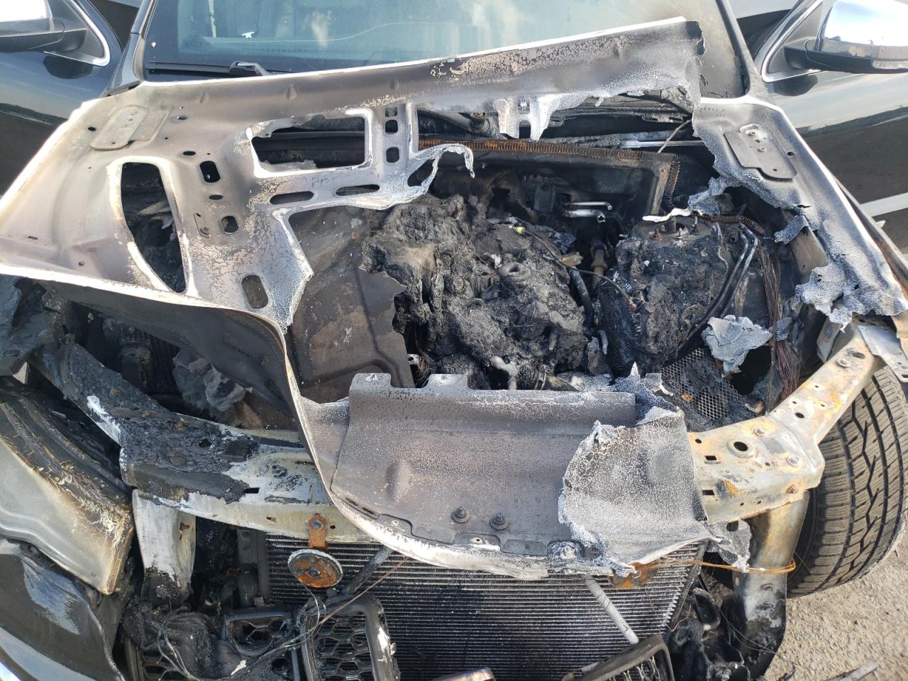 2017 Jeep Grand Cherokee VIN 1C4RJFCG3HC957040 Copart auction photo, burn - engine damage thumbnail 12
