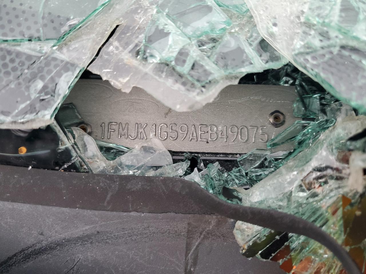 2010 Ford Expedition VIN 1FMJK1G59AEB49075 Copart auction photo, undercarriage / all over damage thumbnail 13