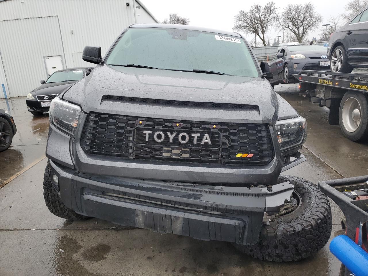 2021 Toyota Tundra VIN 5TFHY5F13MX028137 Copart auction photo, front end / side damage thumbnail 5