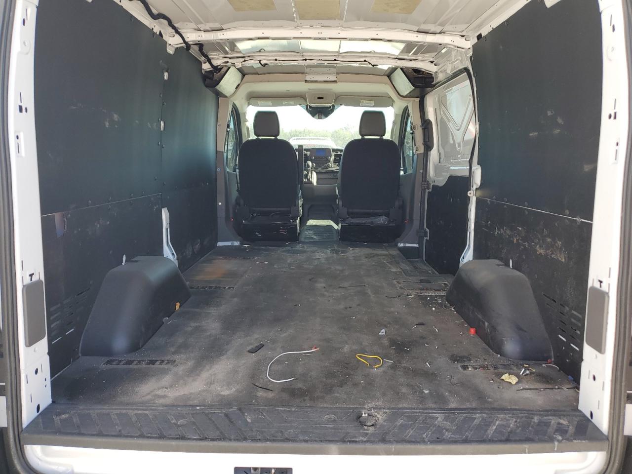 2023 Ford Transit VIN 1FTBR1Y86PKC04279 Copart auction photo, water/flood damage thumbnail 10