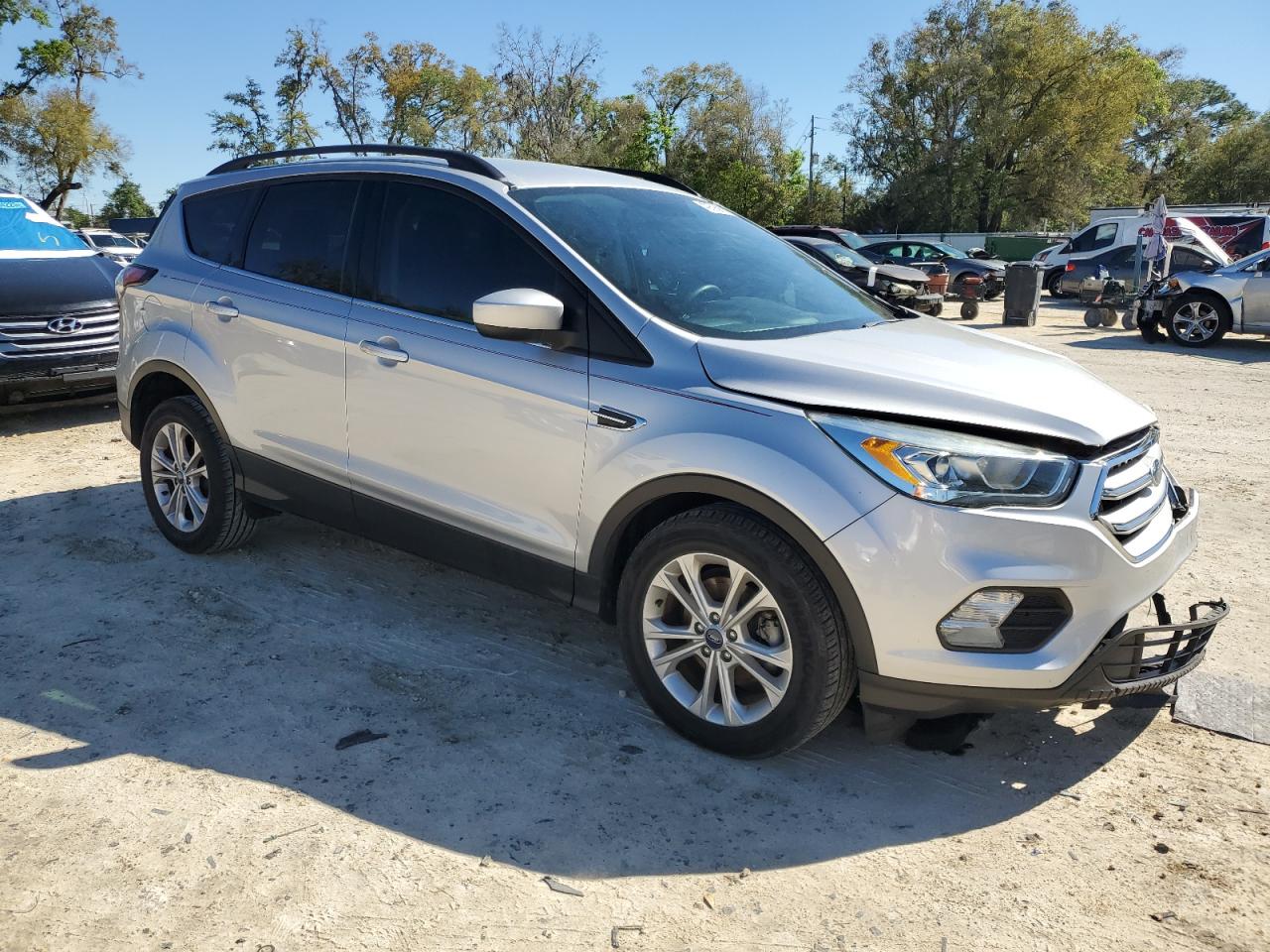 2018 Ford Escape VIN 1FMCU0HD0JUA07349 Copart auction photo, front end / minor dent/scratches damage thumbnail 4