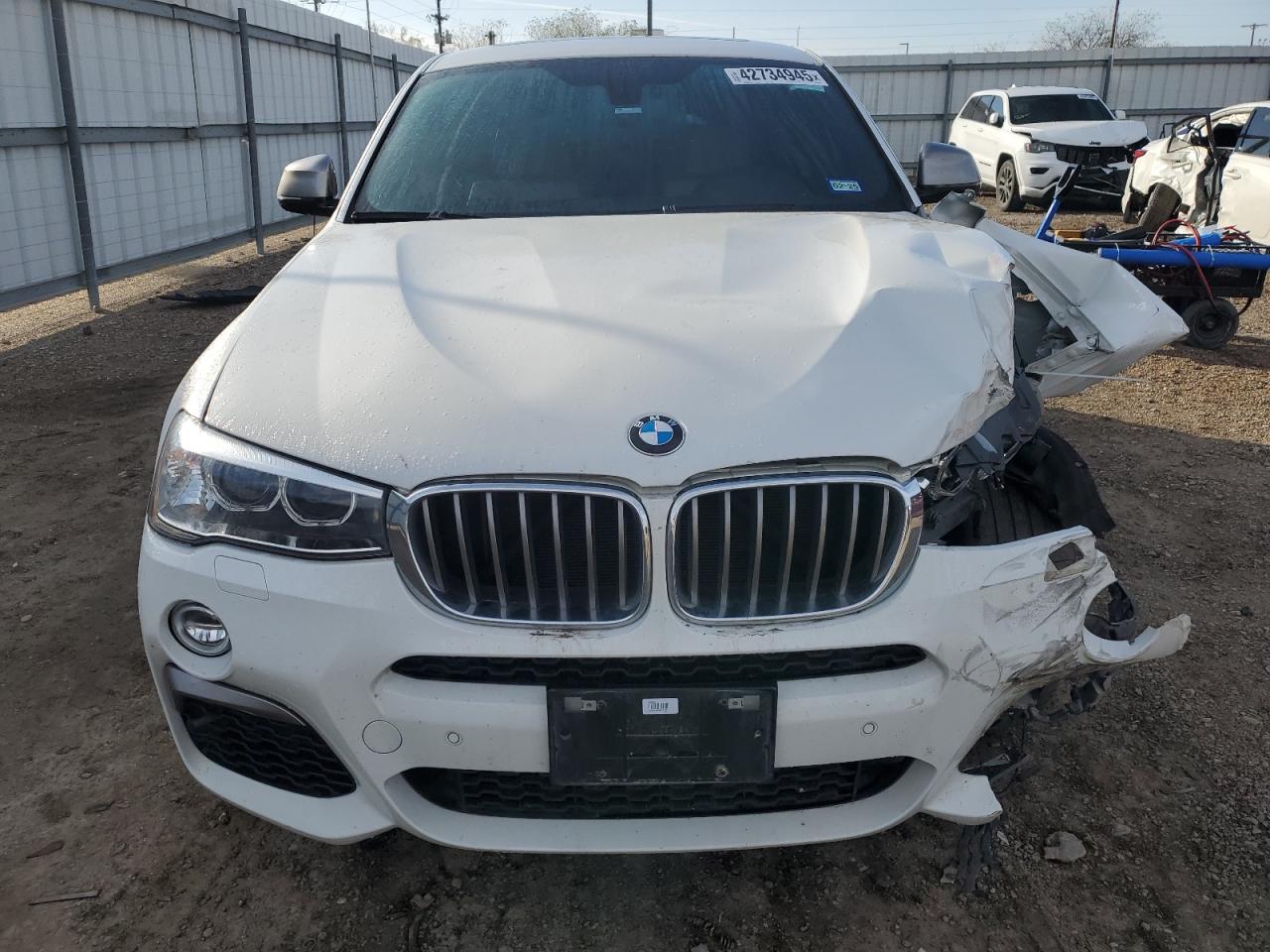 2017 BMW X4 VIN 5UXXW7C3XH0W63663 Copart auction photo, front end / undercarriage damage thumbnail 5
