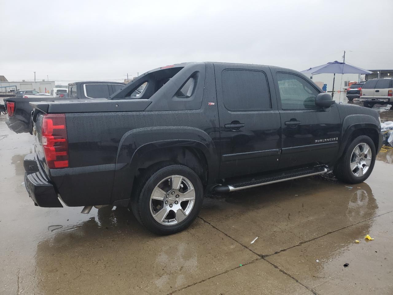 2009 Chevrolet Avalanche VIN 3GNEC22J39G125976 Copart auction photo, hail damage thumbnail 3