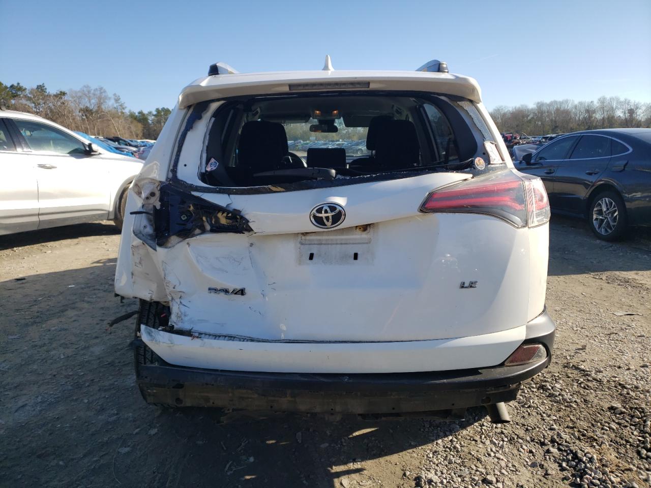 2018 Toyota RAV 4 VIN JTMZFREV6JJ195614 Copart auction photo, rear end damage thumbnail 6