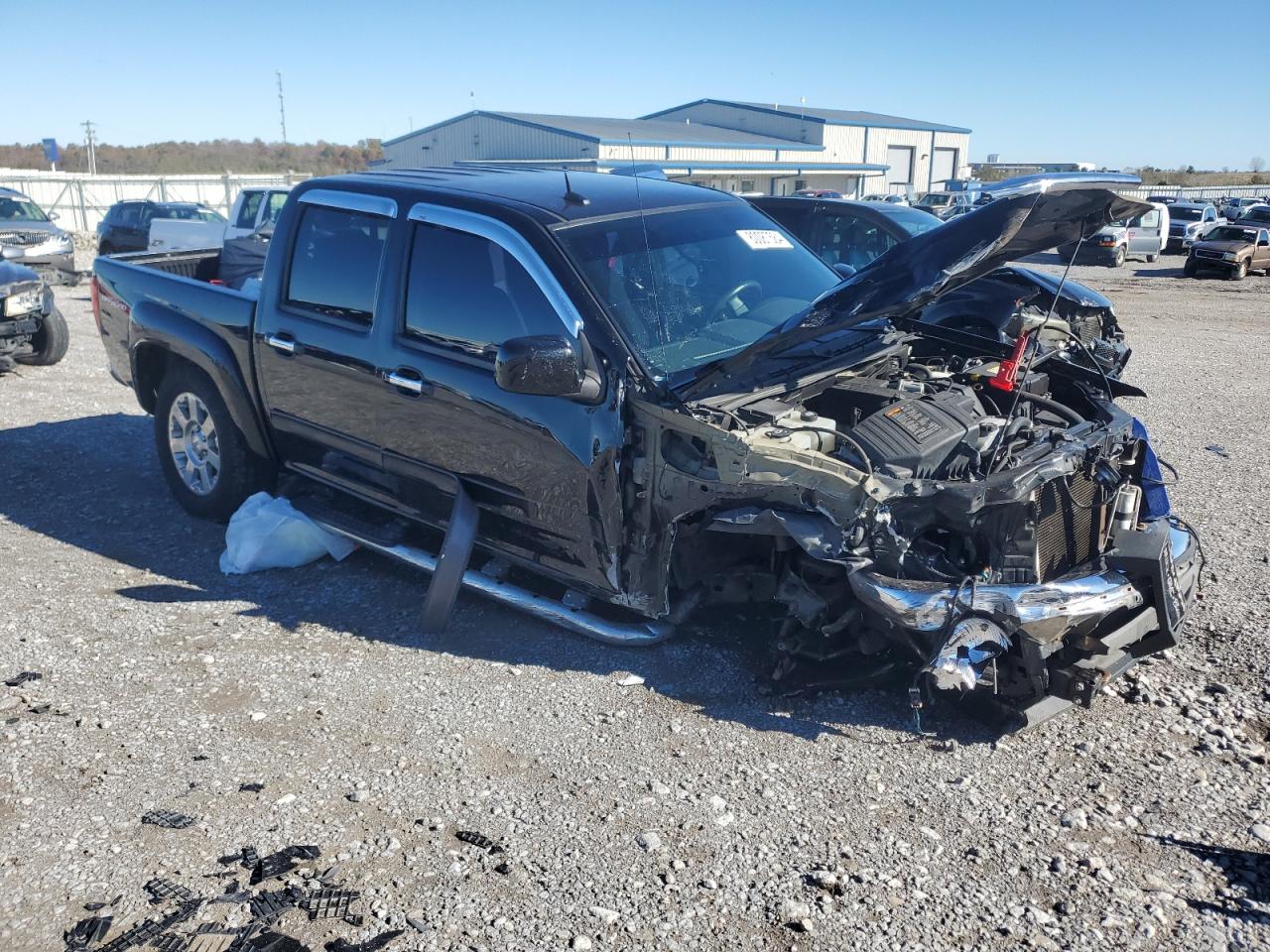 2012 GMC Canyon VIN 1GTH6PFE5C8166338 Copart auction photo, side / front end damage thumbnail 4