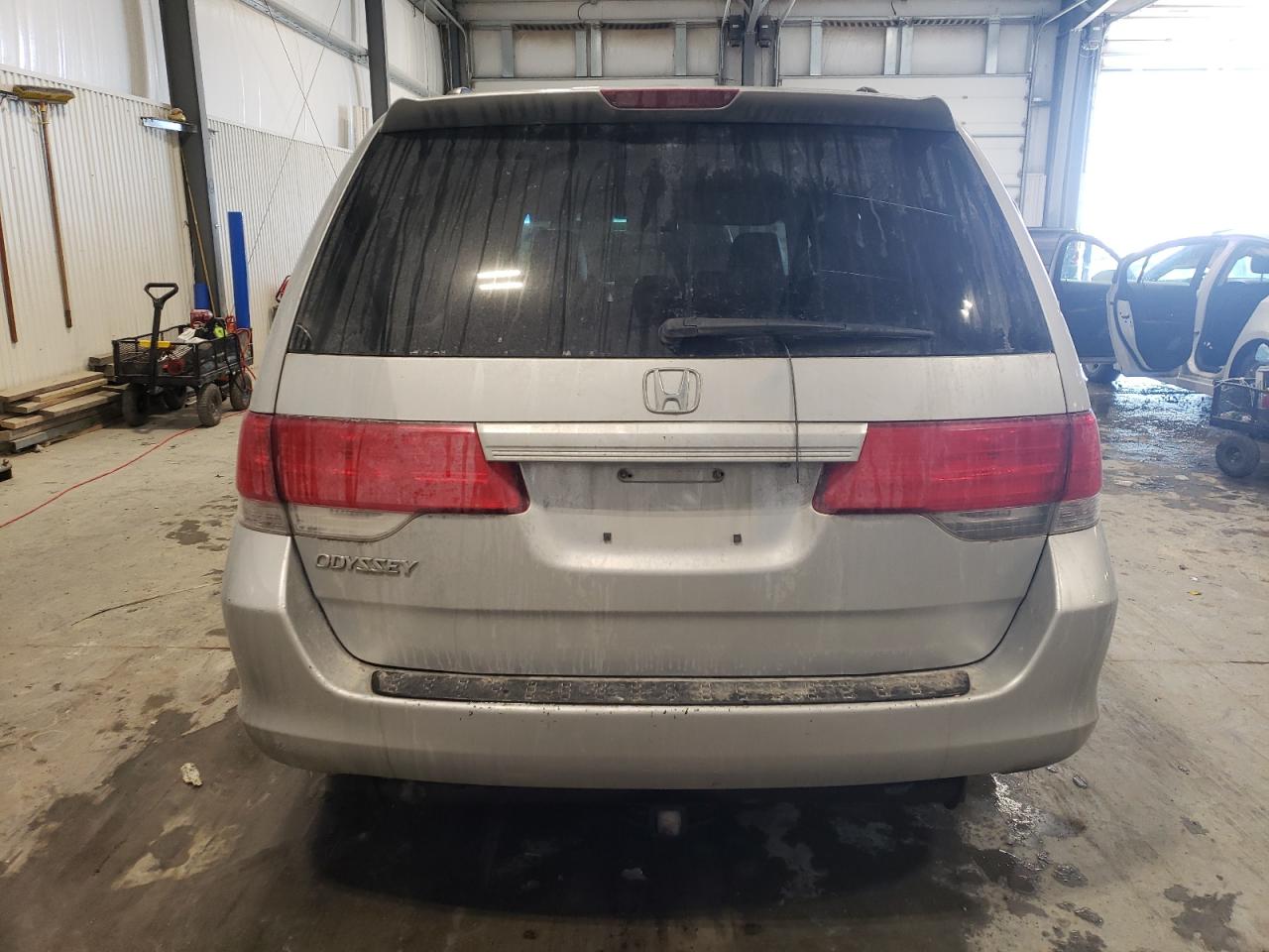 2010 Honda Odyssey VIN 5FNRL3H73AB039203 Copart auction photo, front end / hail damage thumbnail 6
