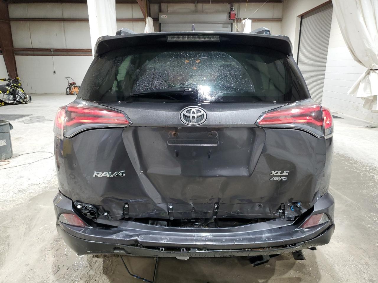 2017 Toyota RAV 4 VIN JTMRFREV2HJ112304 Copart auction photo, rear end damage thumbnail 6
