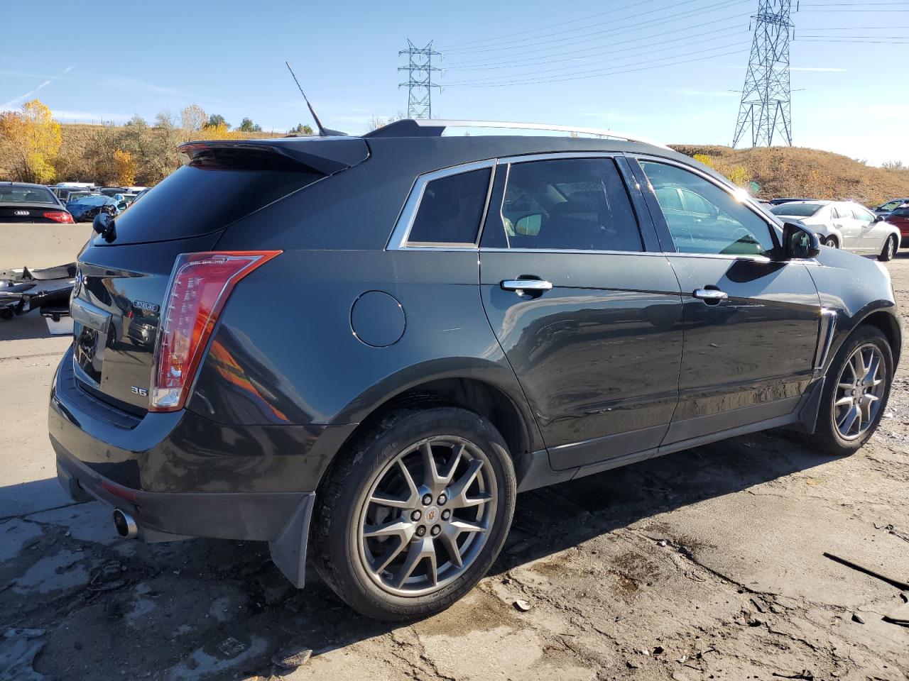 2014 Cadillac SRX VIN 3GYFNGE30ES632613 Copart auction photo, rear end / hail damage thumbnail 3
