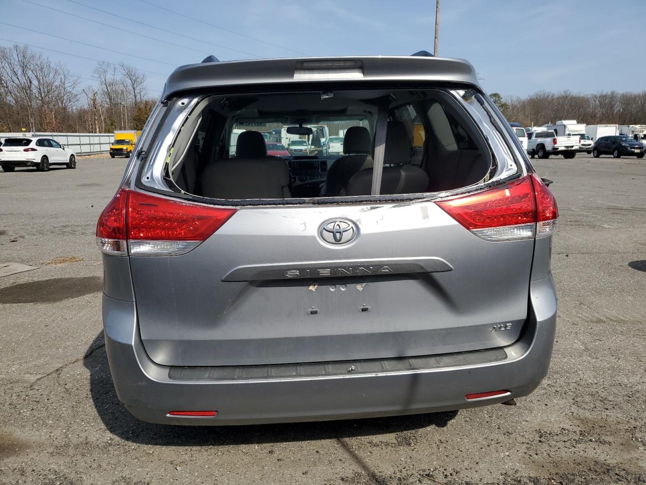 2012 Toyota Sienna VIN 5TDYK3DCXCS235414 Copart auction photo, rear end / front end damage thumbnail 6