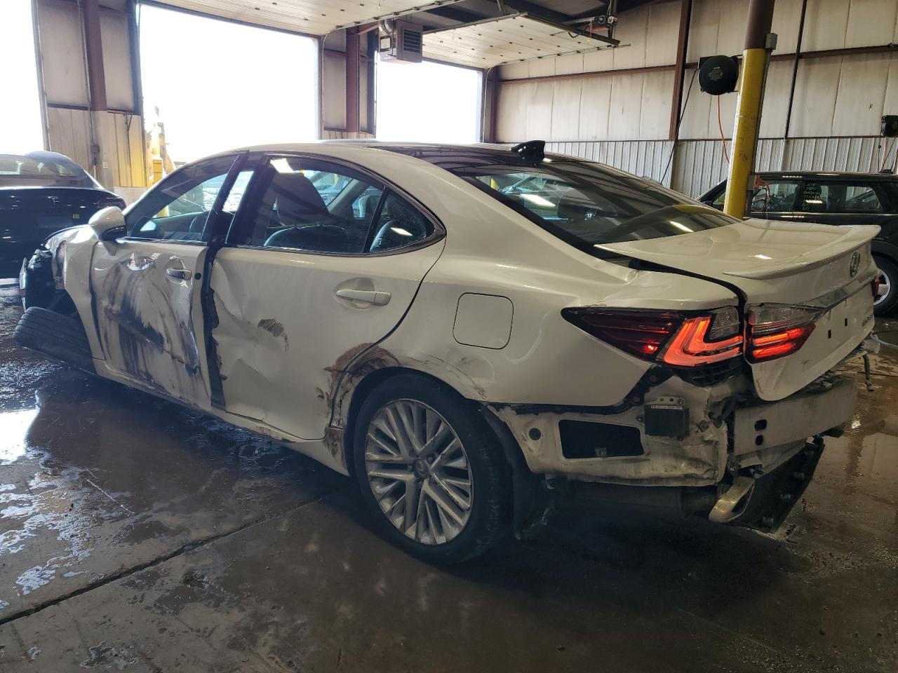 2016 Lexus ES VIN 58ABK1GG0GU023975 Copart auction photo, undercarriage / side damage thumbnail 2