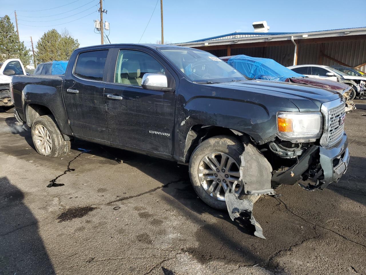 2018 GMC Canyon VIN 1GTG5DENXJ1134280 Copart auction photo, front end / side damage thumbnail 4