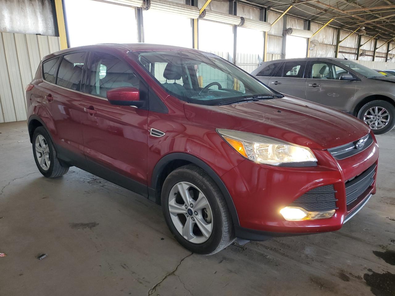 2016 Ford Escape VIN 1FMCU0G71GUA85112 Copart auction photo, side / rear end damage thumbnail 4