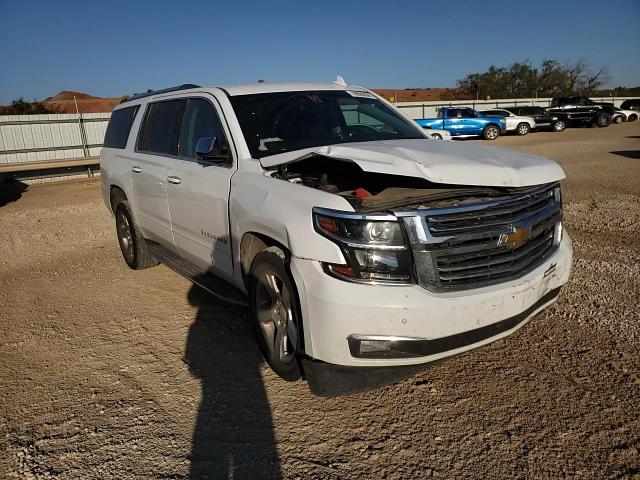 2018 Chevrolet Suburban VIN 1GNSCJKC9JR196800 Copart auction photo, front end / hail damage thumbnail 11