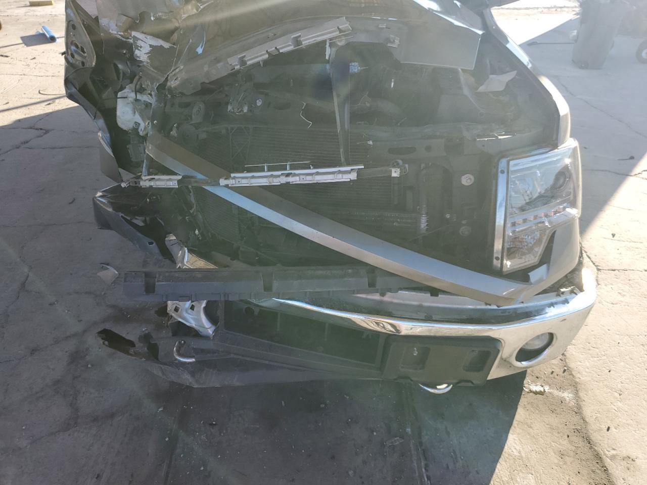 2014 Ford F-150 VIN 1FTFW1ET1EFA50962 Copart auction photo, all over damage thumbnail 12