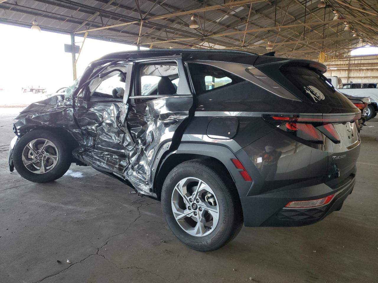 2024 Hyundai Tucson VIN 5NMJBCDEXRH313852 Copart auction photo, side / front end damage thumbnail 2