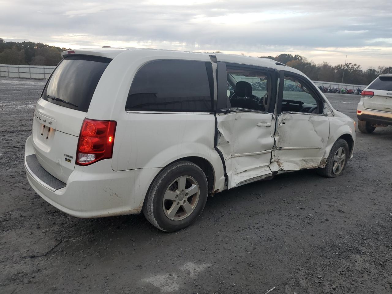 2012 Dodge Caravan VIN 2C4RDGDG0CR110584 Copart auction photo, all over / minor dent/scratches damage thumbnail 3